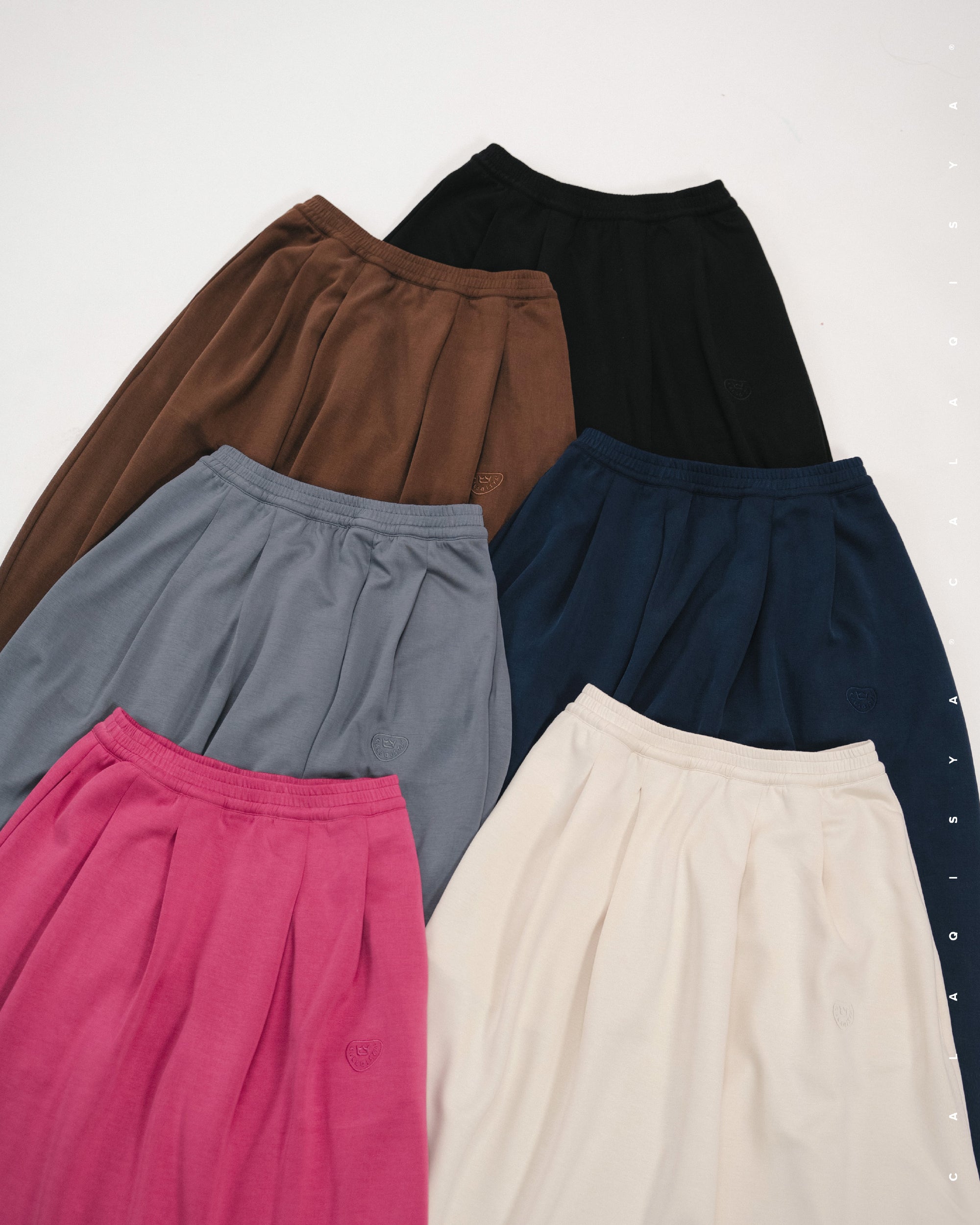 RUSH COCOON SKIRT IN FUCHSIA ROSE