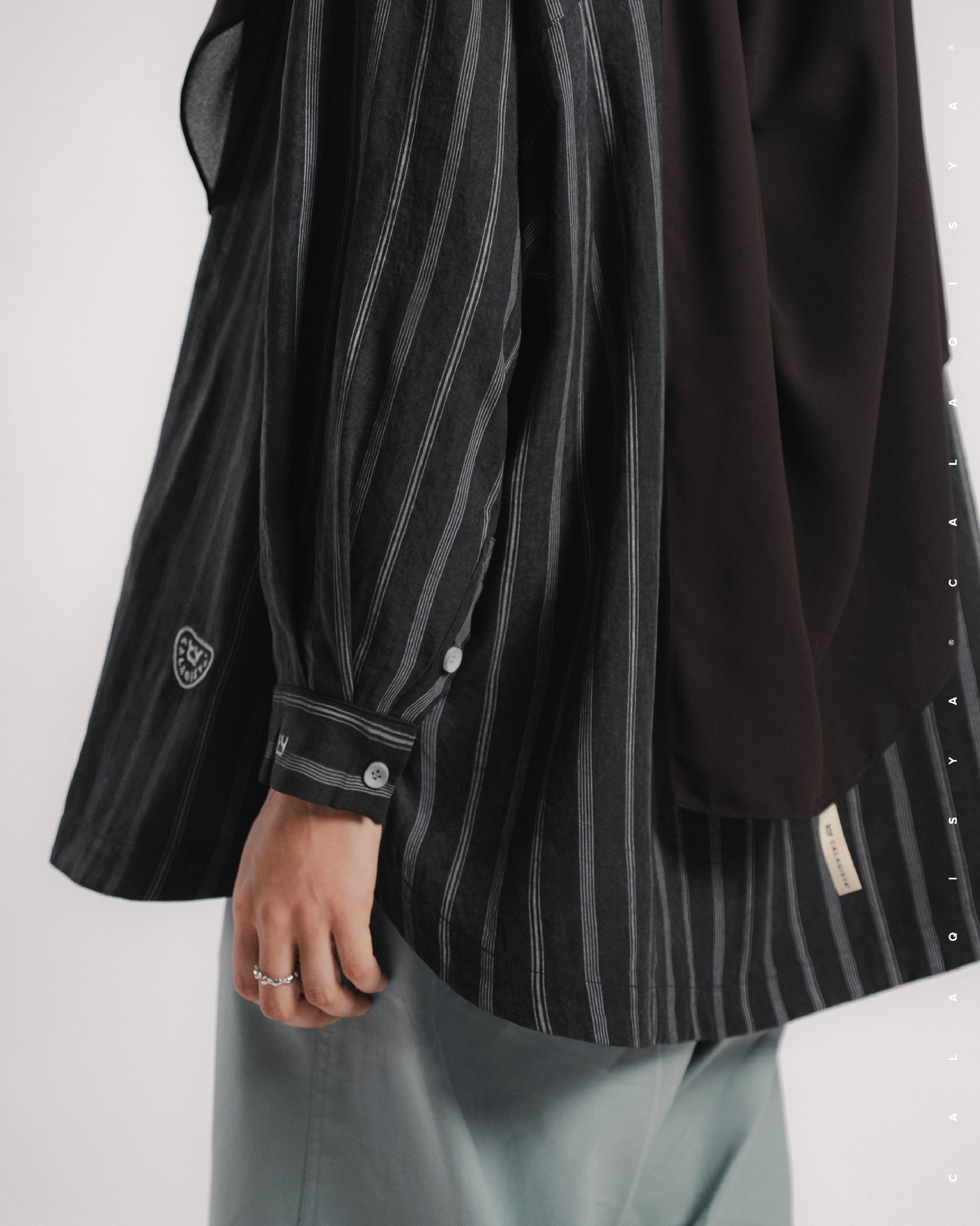 AMBER JESTER TOP IN BLACK