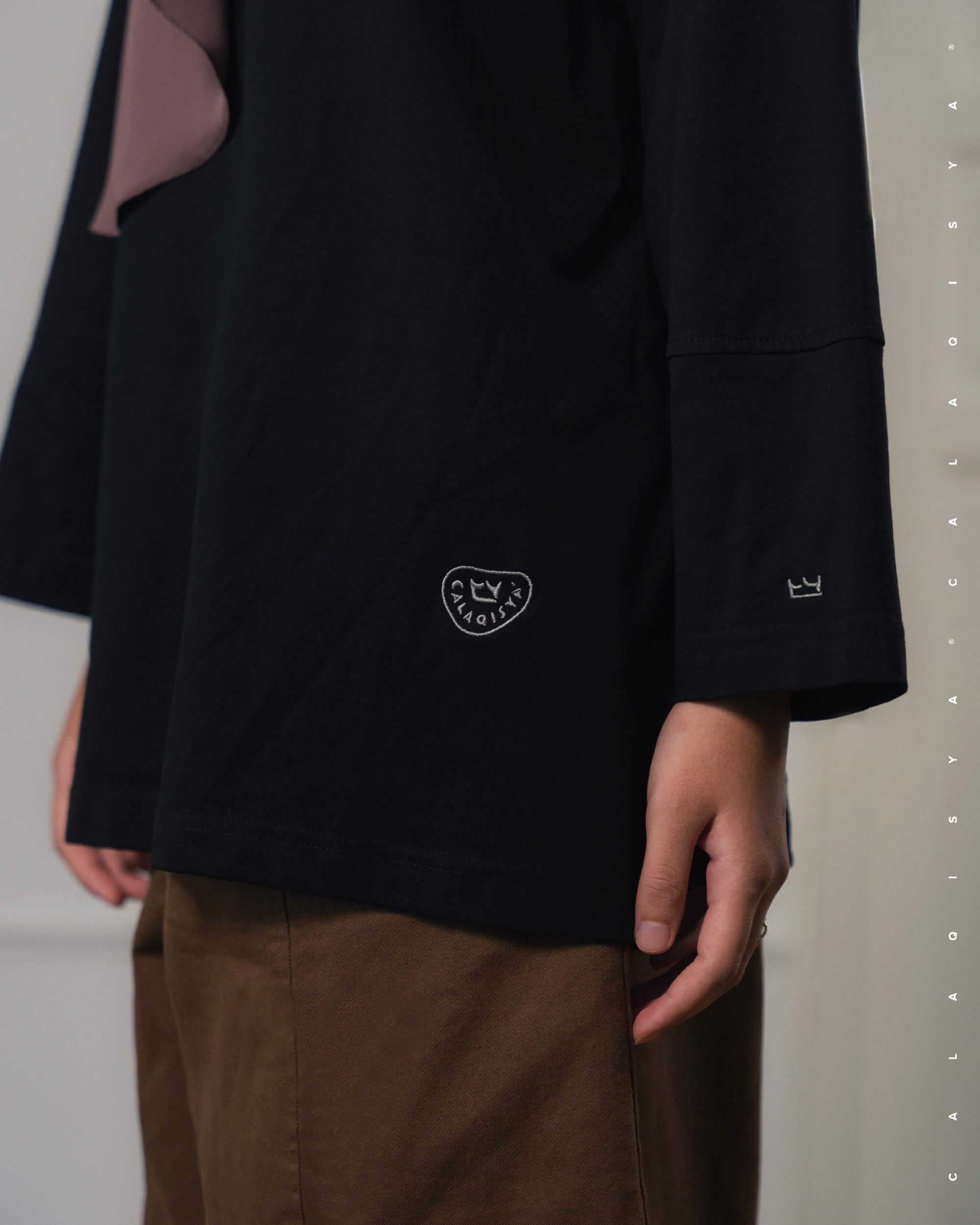 CROSSLINE FLEX TOP IN BLACK