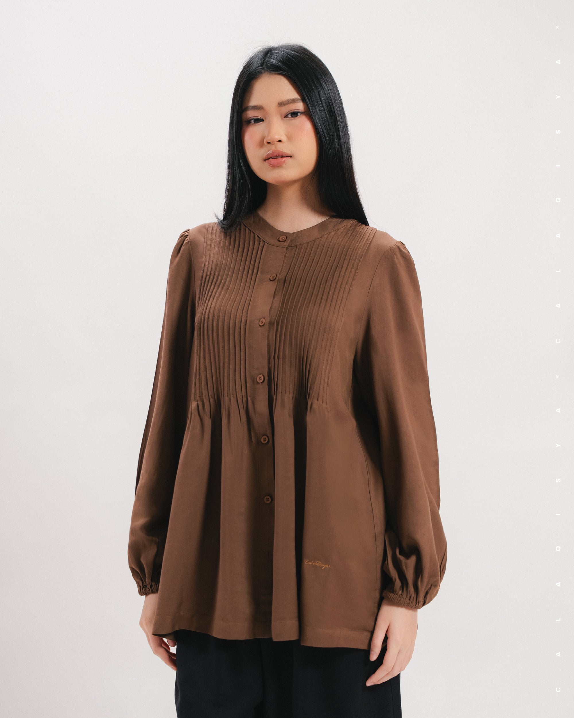 CELIA IN DOWNTOWN BROWN