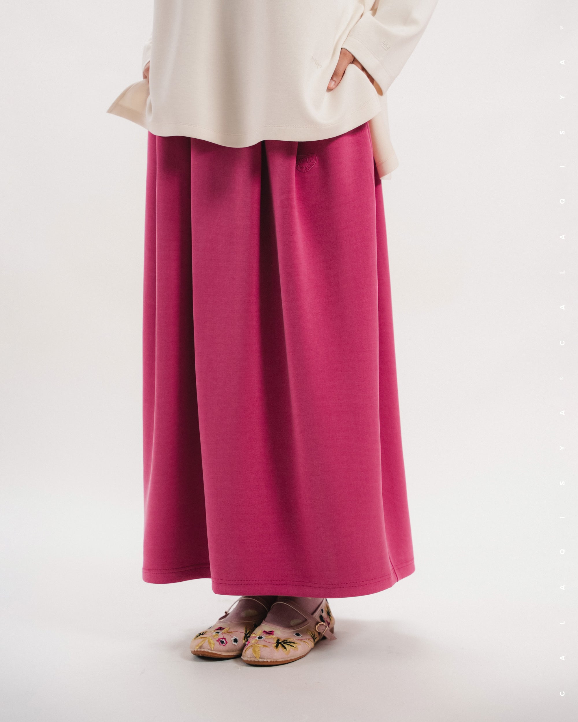RUSH COCOON SKIRT IN FUCHSIA ROSE