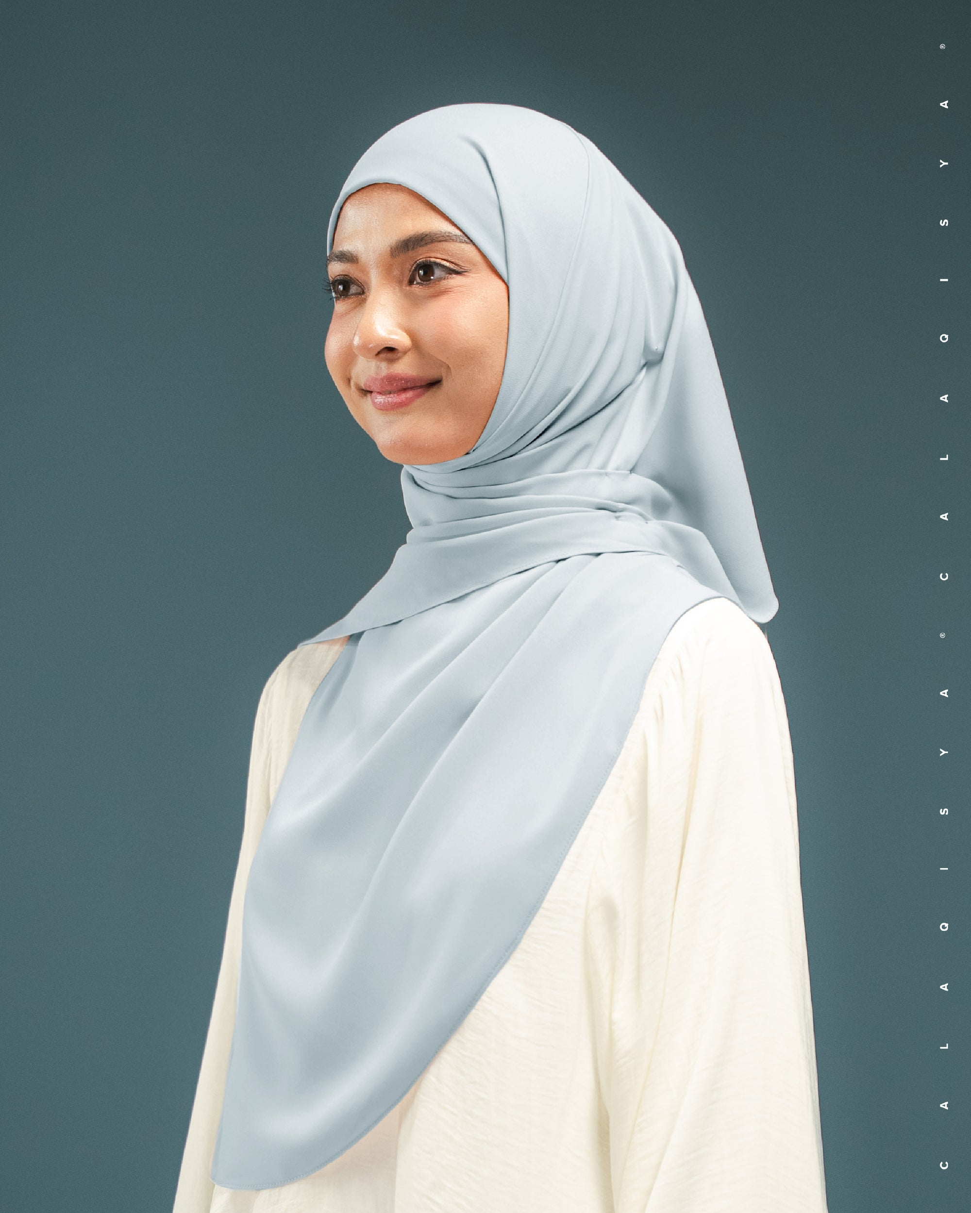 DANIAH TIE BACK UNDERCHIN IN WINTER SKY