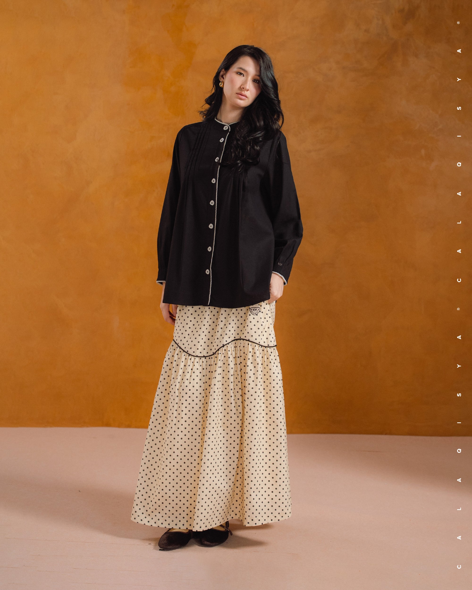 MORA PINTUCK TOP IN BLACK