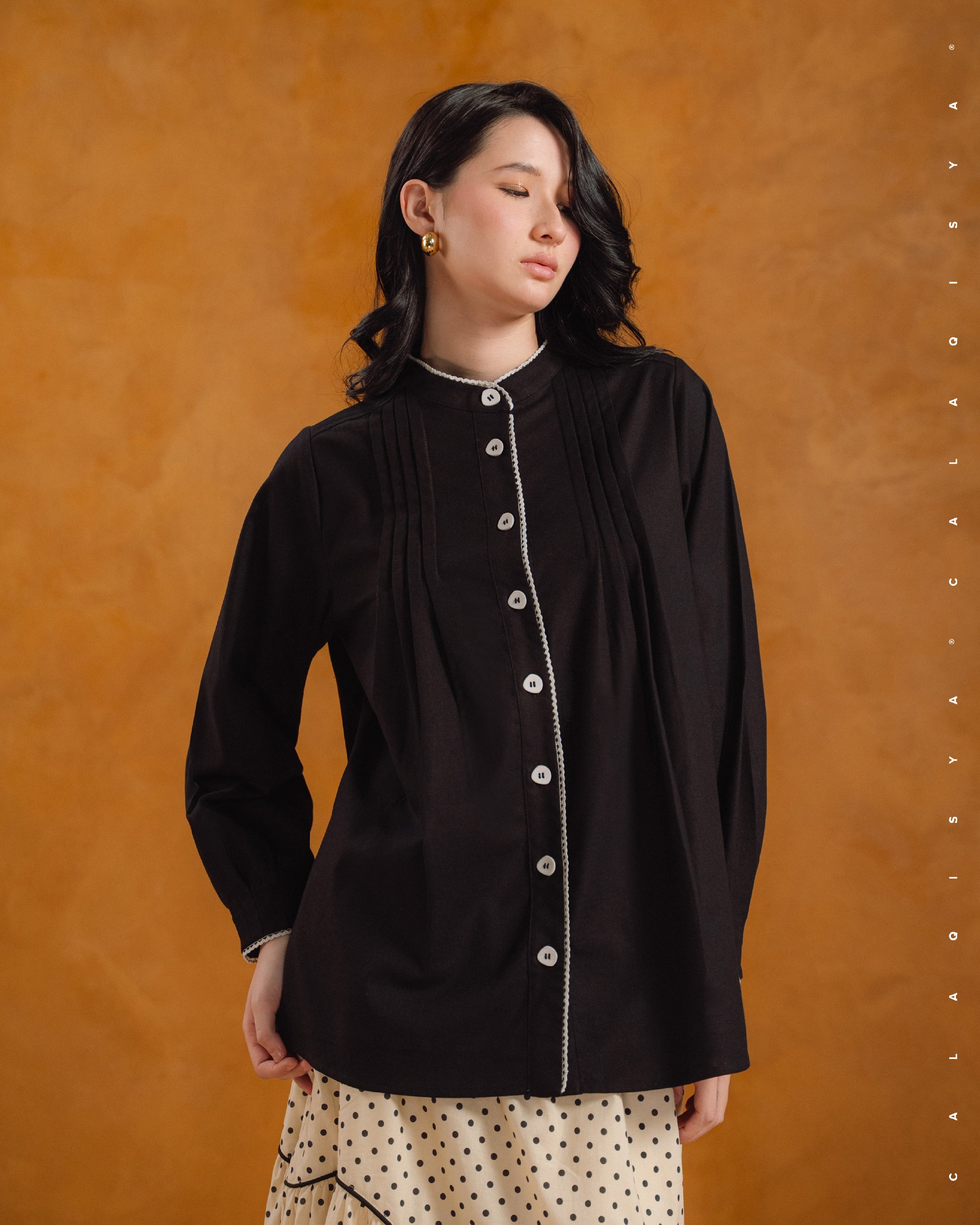 MORA PINTUCK TOP IN BLACK